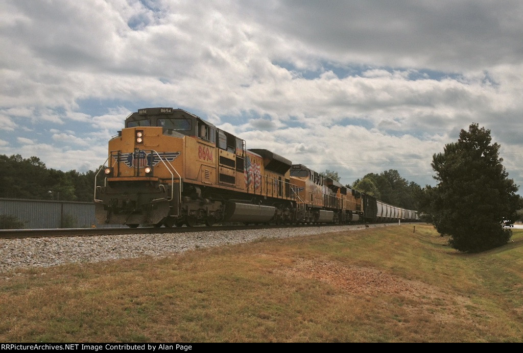 UP 8694, 8108 and 4626 wait for green